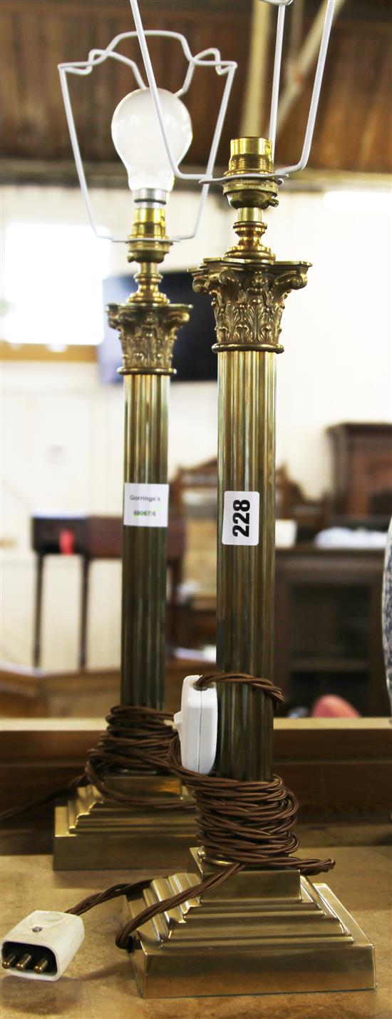 A pair of modern brass lamps